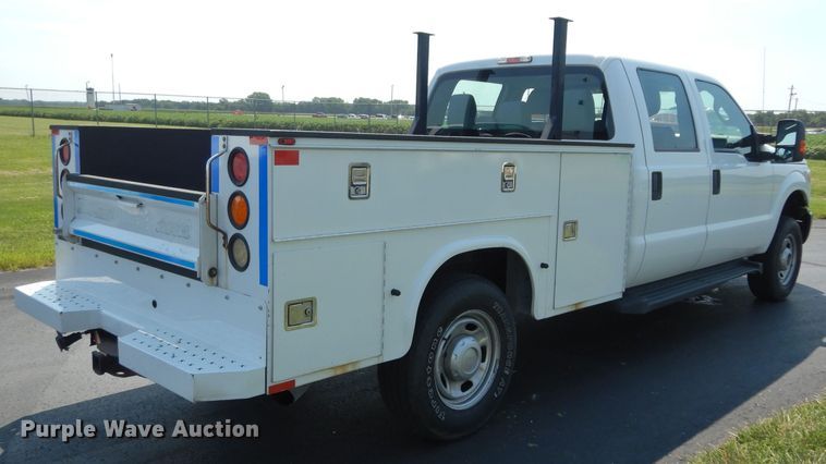image for item DJ4381 2014 Ford F250 Super Duty XL  Crew Cab utility bed pickup truck