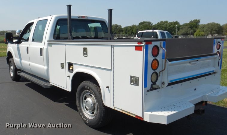 image for item DJ4381 2014 Ford F250 Super Duty XL  Crew Cab utility bed pickup truck