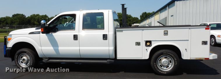 image for item DJ4381 2014 Ford F250 Super Duty XL  Crew Cab utility bed pickup truck