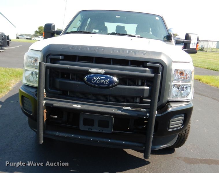 image for item DJ4383 2014 Ford F250 Super Duty XL  Crew Cab utility bed pickup truck