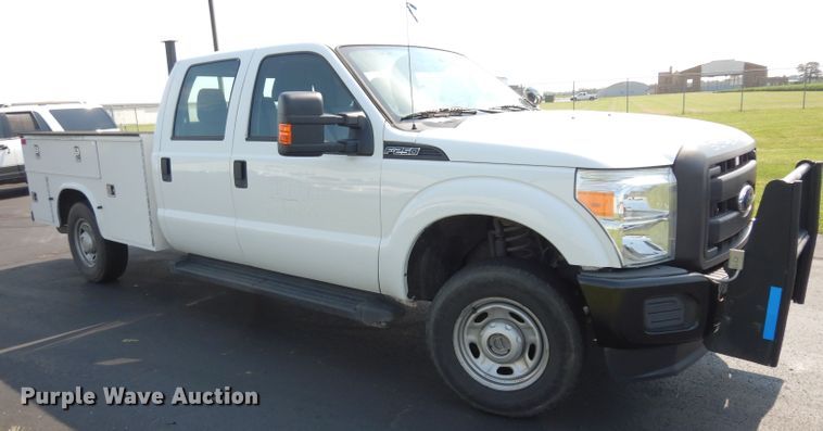 image for item DJ4383 2014 Ford F250 Super Duty XL  Crew Cab utility bed pickup truck