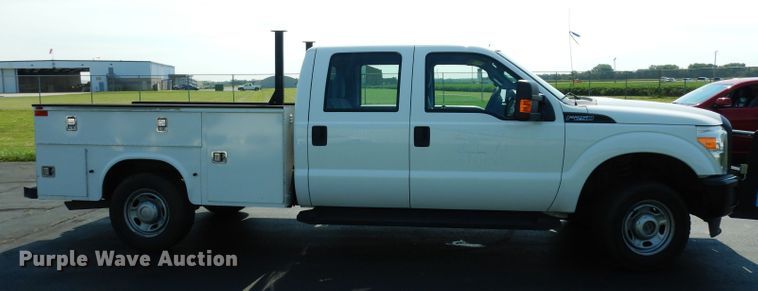 image for item DJ4383 2014 Ford F250 Super Duty XL  Crew Cab utility bed pickup truck