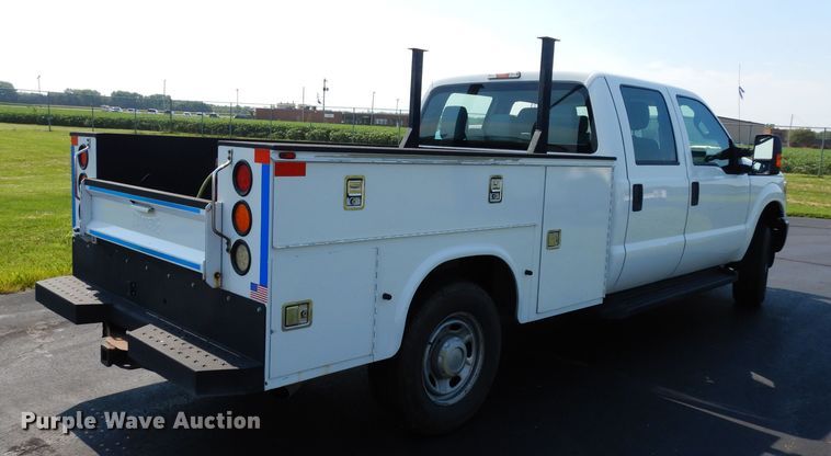 image for item DJ4383 2014 Ford F250 Super Duty XL  Crew Cab utility bed pickup truck