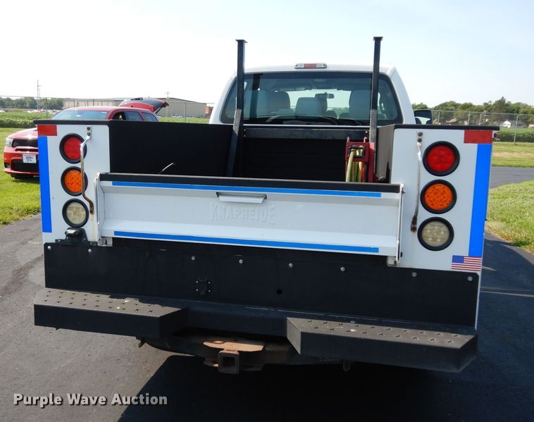 image for item DJ4383 2014 Ford F250 Super Duty XL  Crew Cab utility bed pickup truck