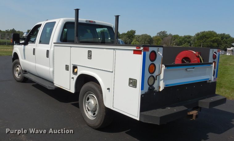 image for item DJ4383 2014 Ford F250 Super Duty XL  Crew Cab utility bed pickup truck