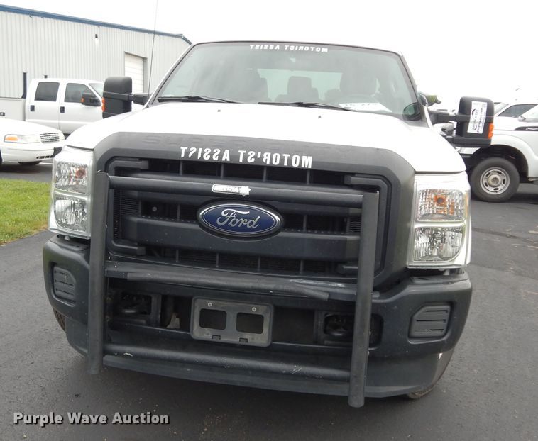 image for item DJ4385 2015 Ford F250 Super Duty  Crew Cab utility bed pickup truck