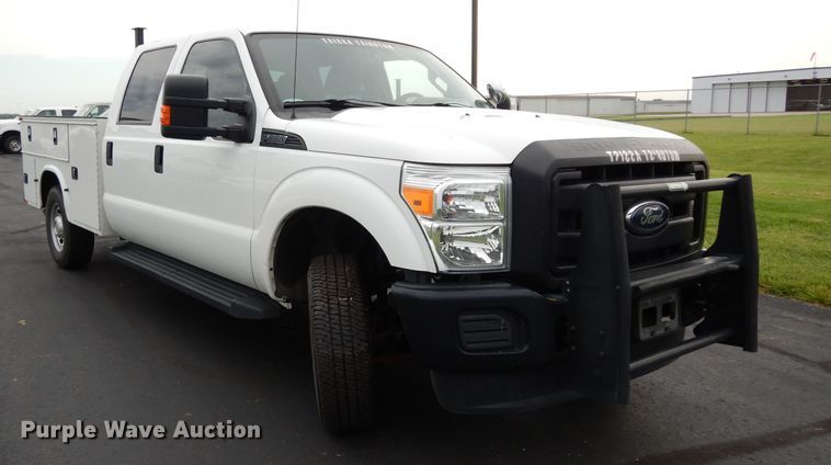 image for item DJ4385 2015 Ford F250 Super Duty  Crew Cab utility bed pickup truck