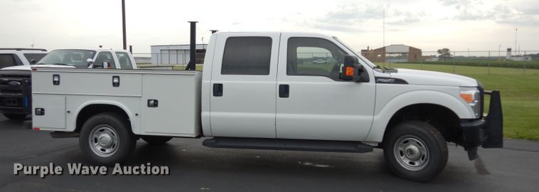 image for item DJ4385 2015 Ford F250 Super Duty  Crew Cab utility bed pickup truck