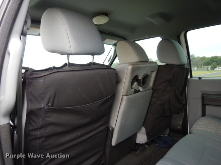 image for item DJ4385 2015 Ford F250 Super Duty  Crew Cab utility bed pickup truck