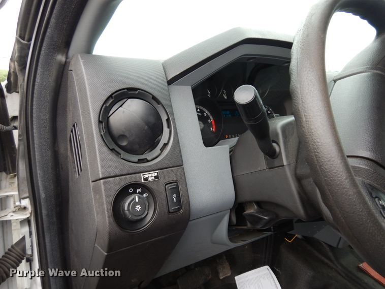 image for item DJ4385 2015 Ford F250 Super Duty  Crew Cab utility bed pickup truck