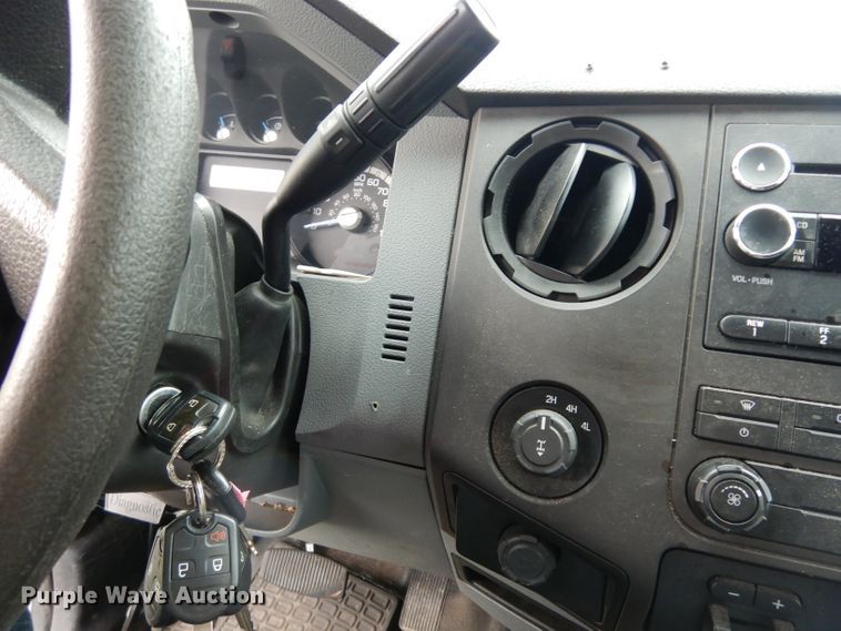 image for item DJ4385 2015 Ford F250 Super Duty  Crew Cab utility bed pickup truck