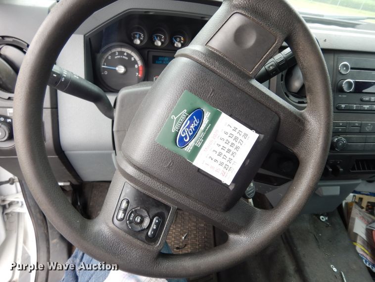 image for item DJ4385 2015 Ford F250 Super Duty  Crew Cab utility bed pickup truck