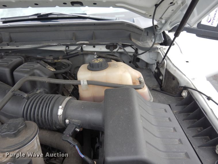 image for item DJ4385 2015 Ford F250 Super Duty  Crew Cab utility bed pickup truck