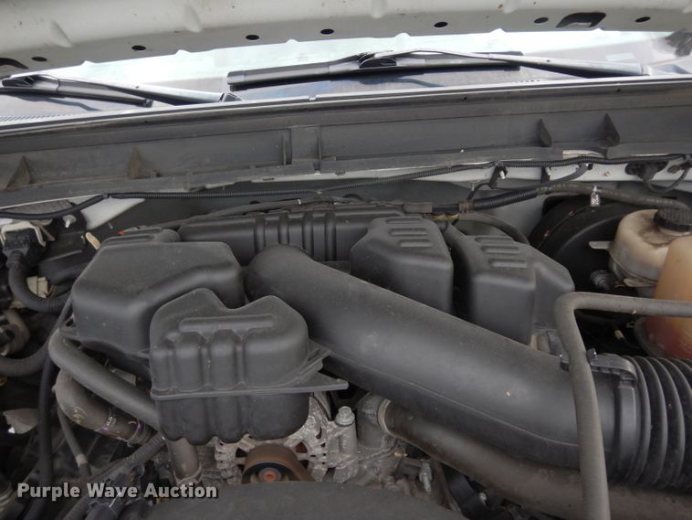 image for item DJ4385 2015 Ford F250 Super Duty  Crew Cab utility bed pickup truck