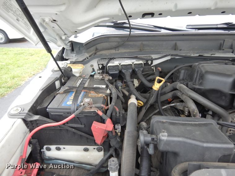 image for item DJ4385 2015 Ford F250 Super Duty  Crew Cab utility bed pickup truck