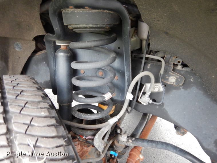 image for item DJ4385 2015 Ford F250 Super Duty  Crew Cab utility bed pickup truck