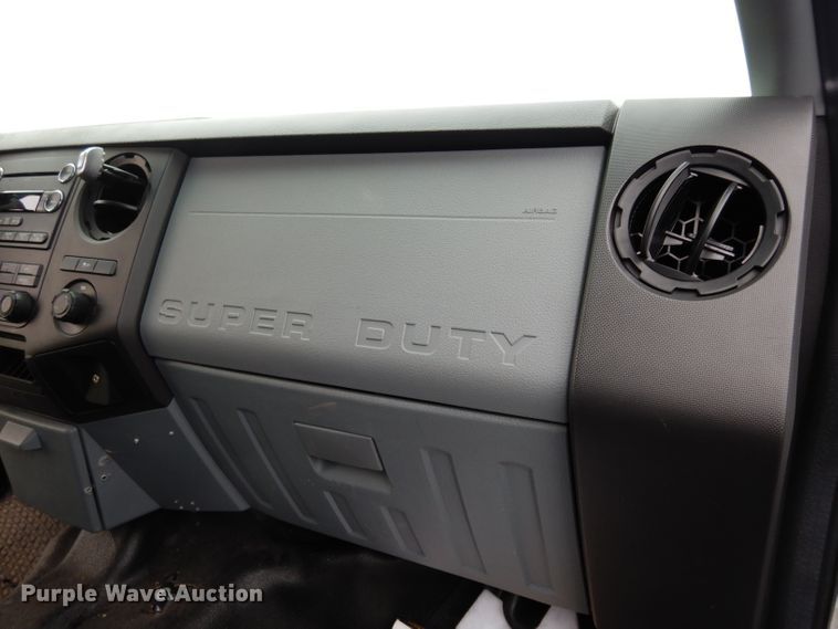 image for item DJ4385 2015 Ford F250 Super Duty  Crew Cab utility bed pickup truck