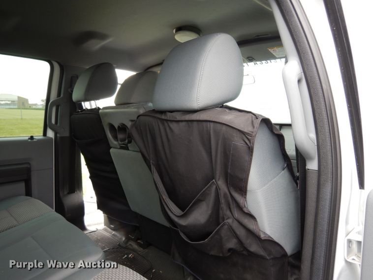 image for item DJ4385 2015 Ford F250 Super Duty  Crew Cab utility bed pickup truck