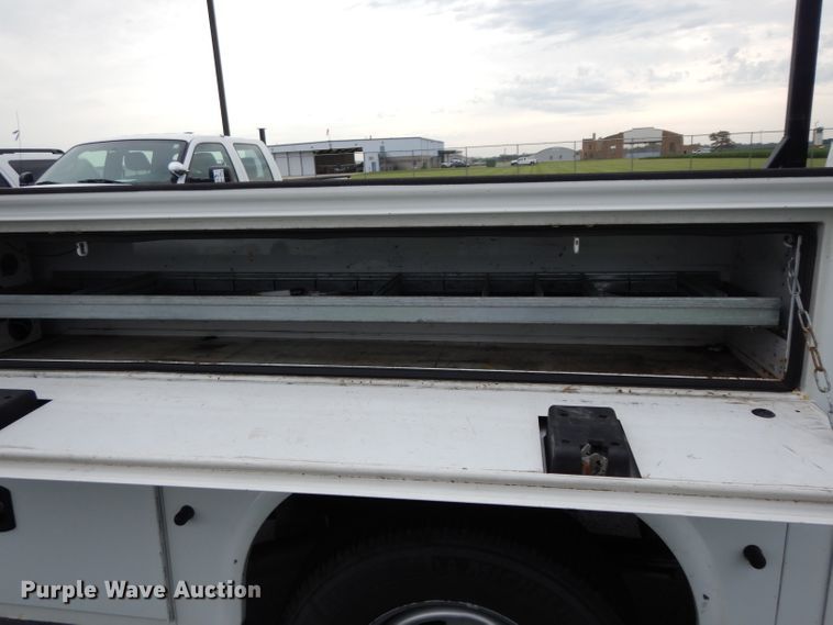 image for item DJ4385 2015 Ford F250 Super Duty  Crew Cab utility bed pickup truck