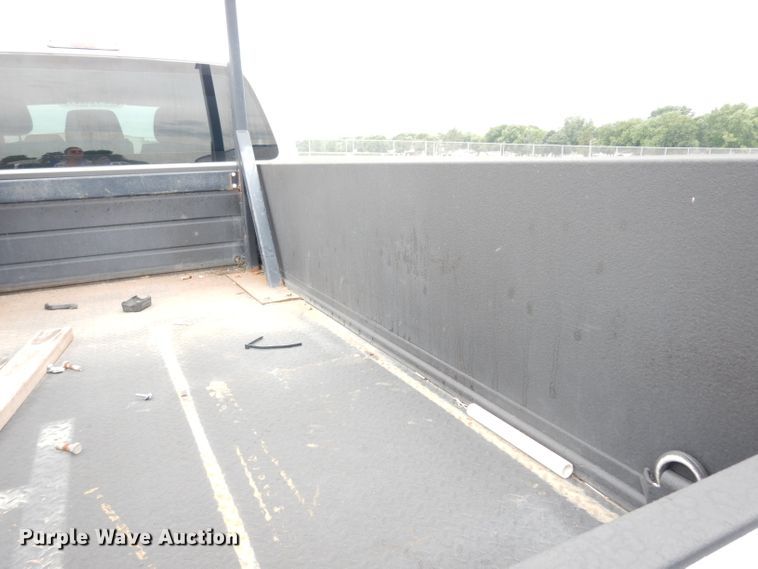 image for item DJ4385 2015 Ford F250 Super Duty  Crew Cab utility bed pickup truck