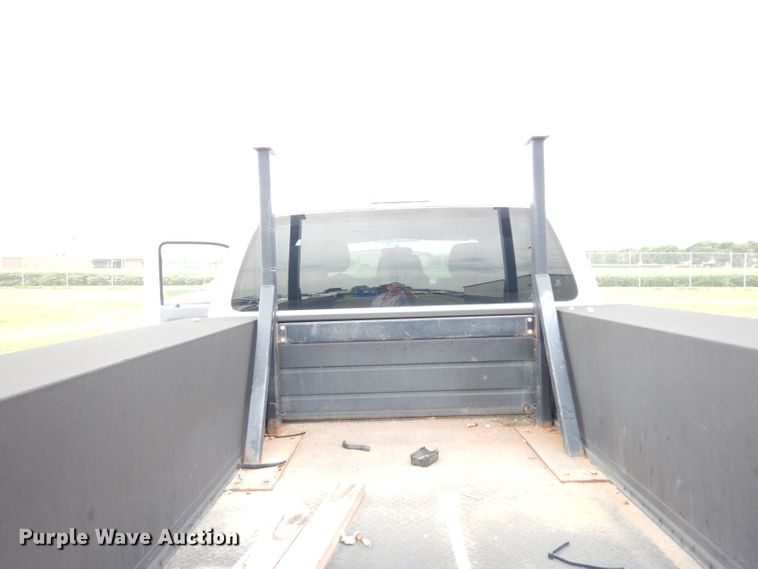 image for item DJ4385 2015 Ford F250 Super Duty  Crew Cab utility bed pickup truck