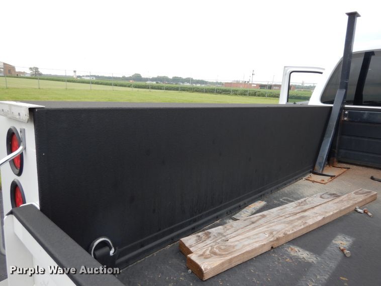 image for item DJ4385 2015 Ford F250 Super Duty  Crew Cab utility bed pickup truck