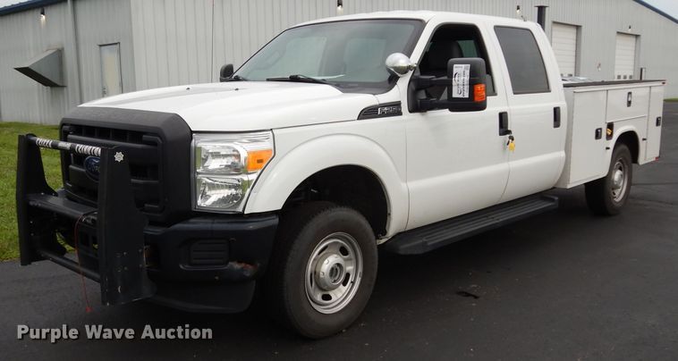 image for item DJ4386 2015 Ford F250 Super Duty XL  Crew Cab utility bed pickup truck