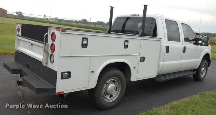 image for item DJ4386 2015 Ford F250 Super Duty XL  Crew Cab utility bed pickup truck