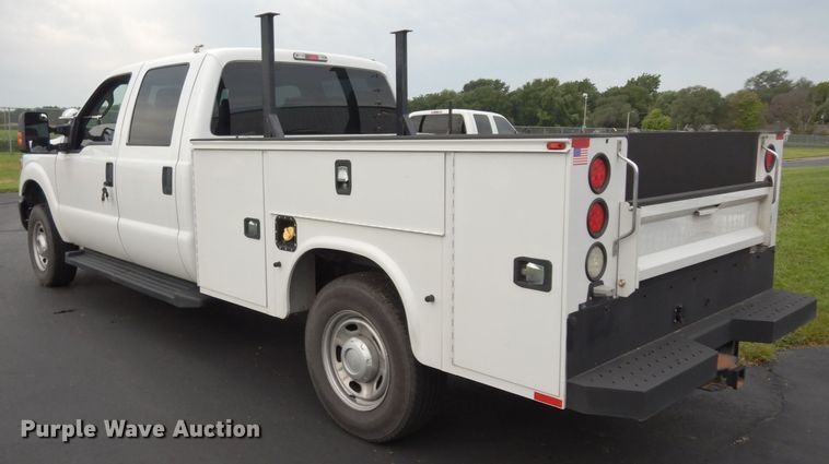 image for item DJ4386 2015 Ford F250 Super Duty XL  Crew Cab utility bed pickup truck