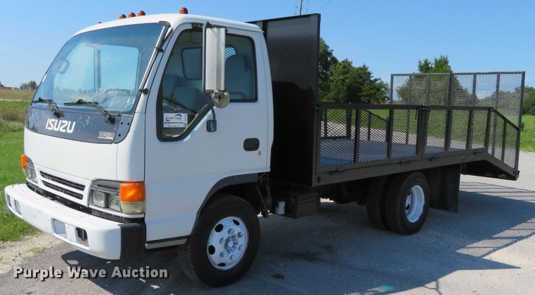 image for item DH1124 2003 Isuzu NPC7SC  flatbed truck