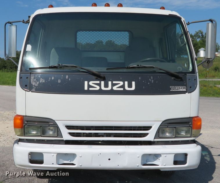 image for item DH1124 2003 Isuzu NPC7SC  flatbed truck