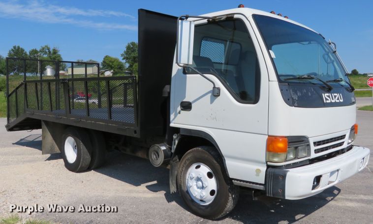 image for item DH1124 2003 Isuzu NPC7SC  flatbed truck