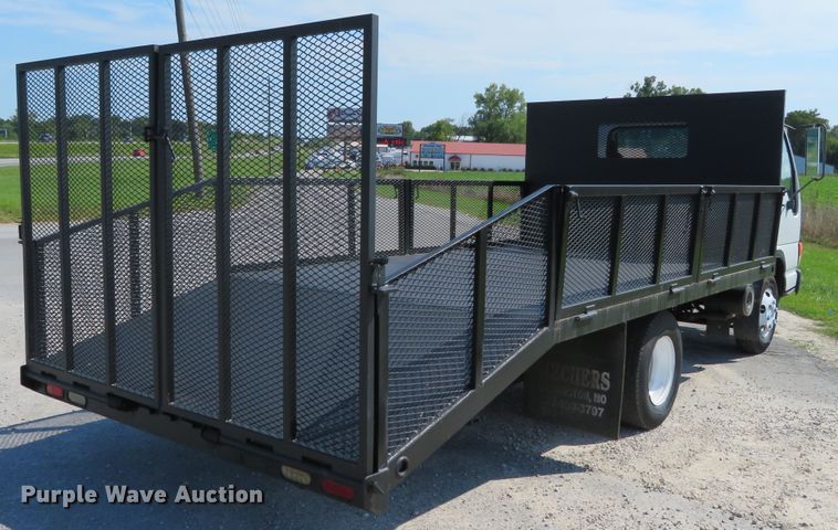 image for item DH1124 2003 Isuzu NPC7SC  flatbed truck