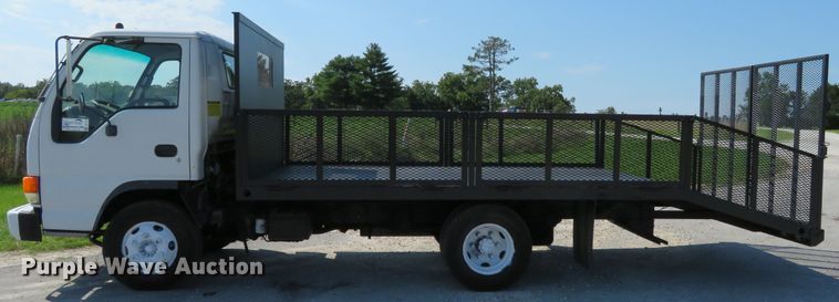 image for item DH1124 2003 Isuzu NPC7SC  flatbed truck