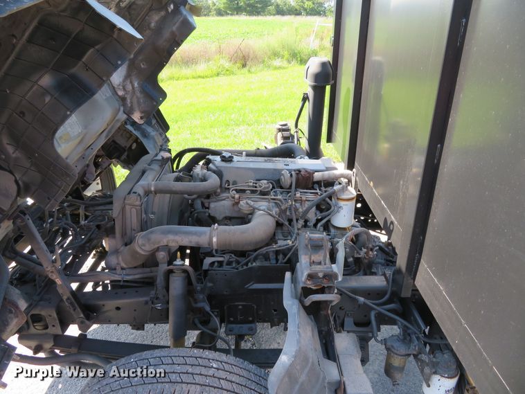 image for item DH1124 2003 Isuzu NPC7SC  flatbed truck