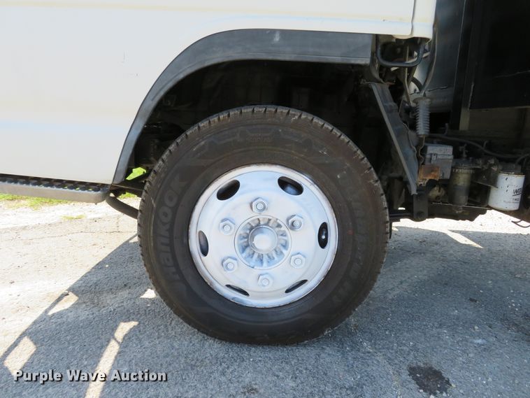 image for item DH1124 2003 Isuzu NPC7SC  flatbed truck