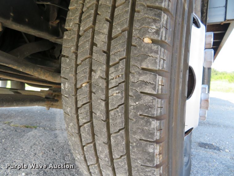 image for item DH1124 2003 Isuzu NPC7SC  flatbed truck