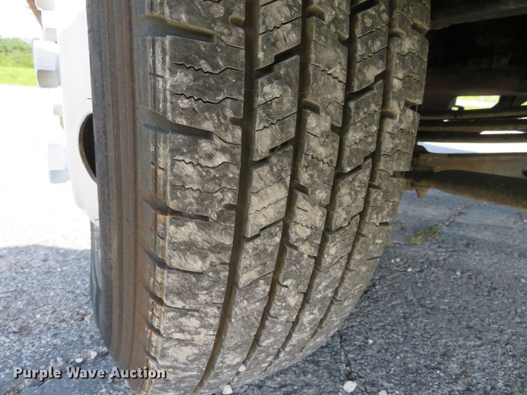 image for item DH1124 2003 Isuzu NPC7SC  flatbed truck