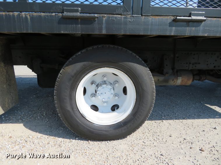 image for item DH1124 2003 Isuzu NPC7SC  flatbed truck