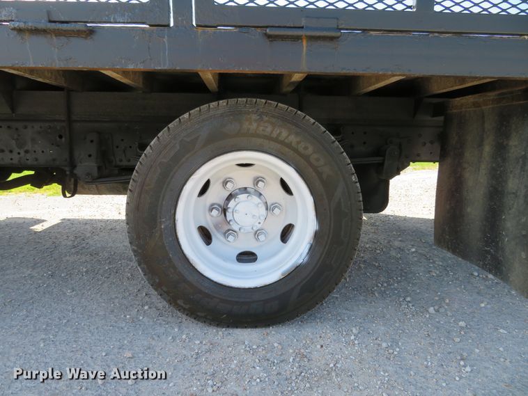 image for item DH1124 2003 Isuzu NPC7SC  flatbed truck