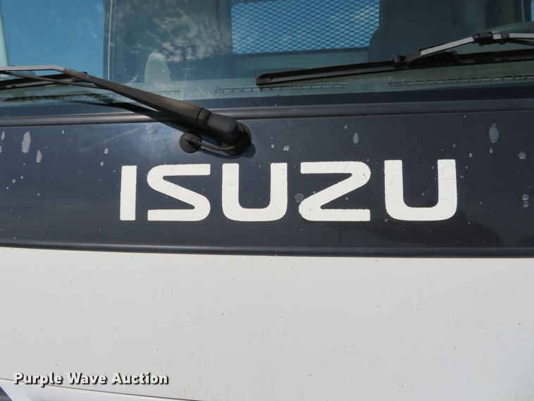 image for item DH1124 2003 Isuzu NPC7SC  flatbed truck