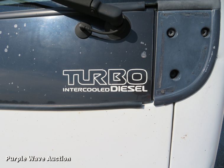 image for item DH1124 2003 Isuzu NPC7SC  flatbed truck