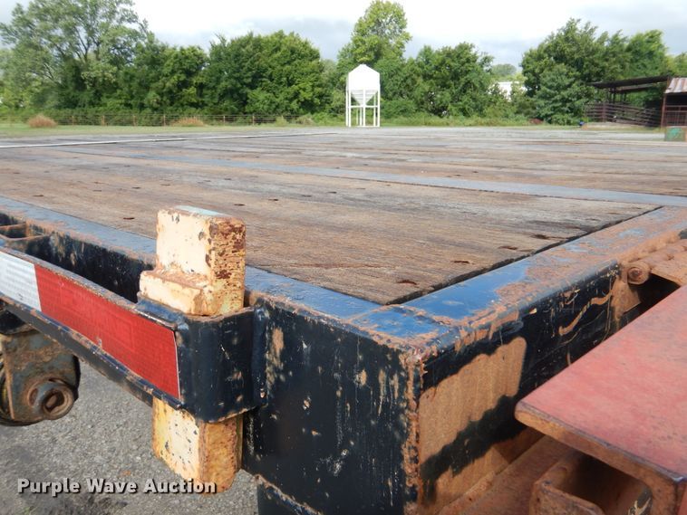 image for item GM9101 2012 Fontaine HCVSD22TAF flatbed trailer