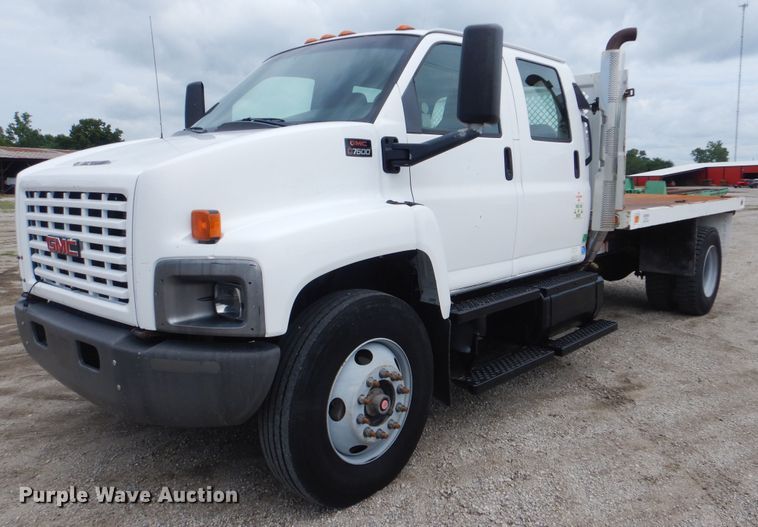 image for item GM9106 2004 GMC C7500  Crew Cab flat dump bed truck