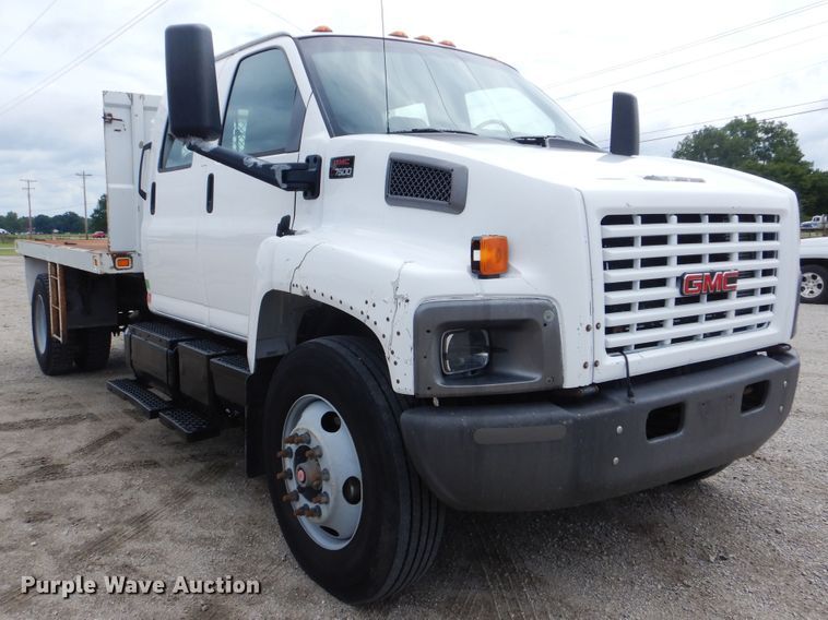image for item GM9106 2004 GMC C7500  Crew Cab flat dump bed truck