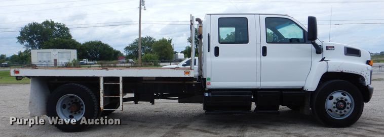 image for item GM9106 2004 GMC C7500  Crew Cab flat dump bed truck