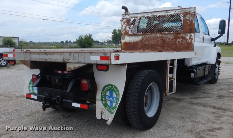 image for item GM9106 2004 GMC C7500  Crew Cab flat dump bed truck