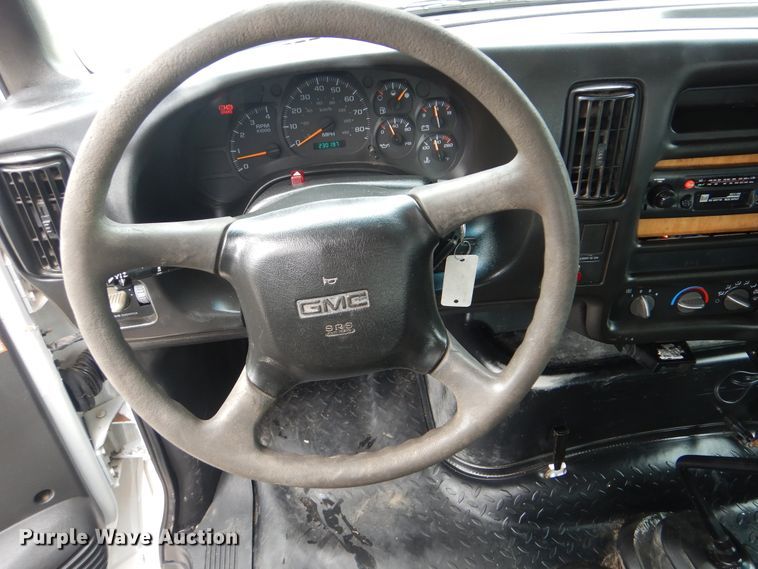 image for item GM9106 2004 GMC C7500  Crew Cab flat dump bed truck