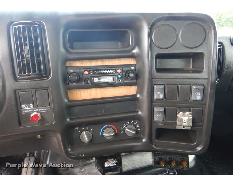 image for item GM9106 2004 GMC C7500  Crew Cab flat dump bed truck