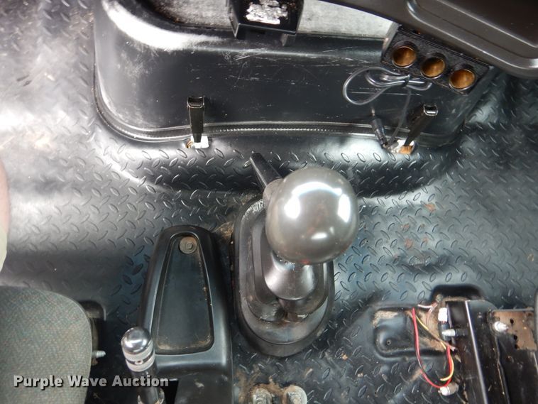 image for item GM9106 2004 GMC C7500  Crew Cab flat dump bed truck